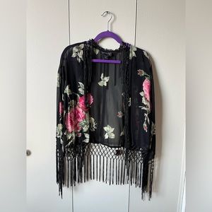 Elegant jacket with tassels